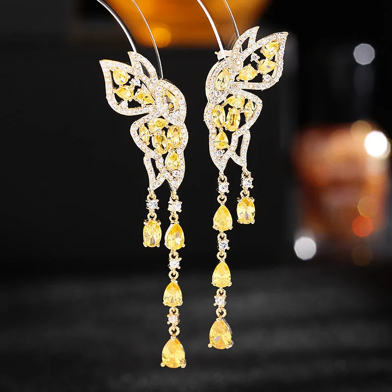 long face-modifying butterfly water drop tassel earrings